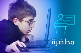 A boy is looks consumed while looking at a computer screen