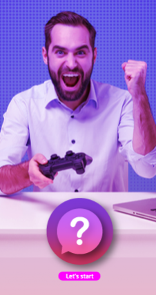 A businessman has a game controller in his hand and his gesturing that he has won the game 