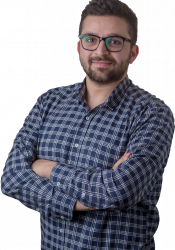 Joseph Feghaly posing for the picture, arms crosed.