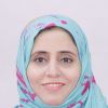  صورة الملف الشخصي للخبيرة روبيا فاطمة وهي ترتدي حجاباً أزرق اللون وتبتسم.